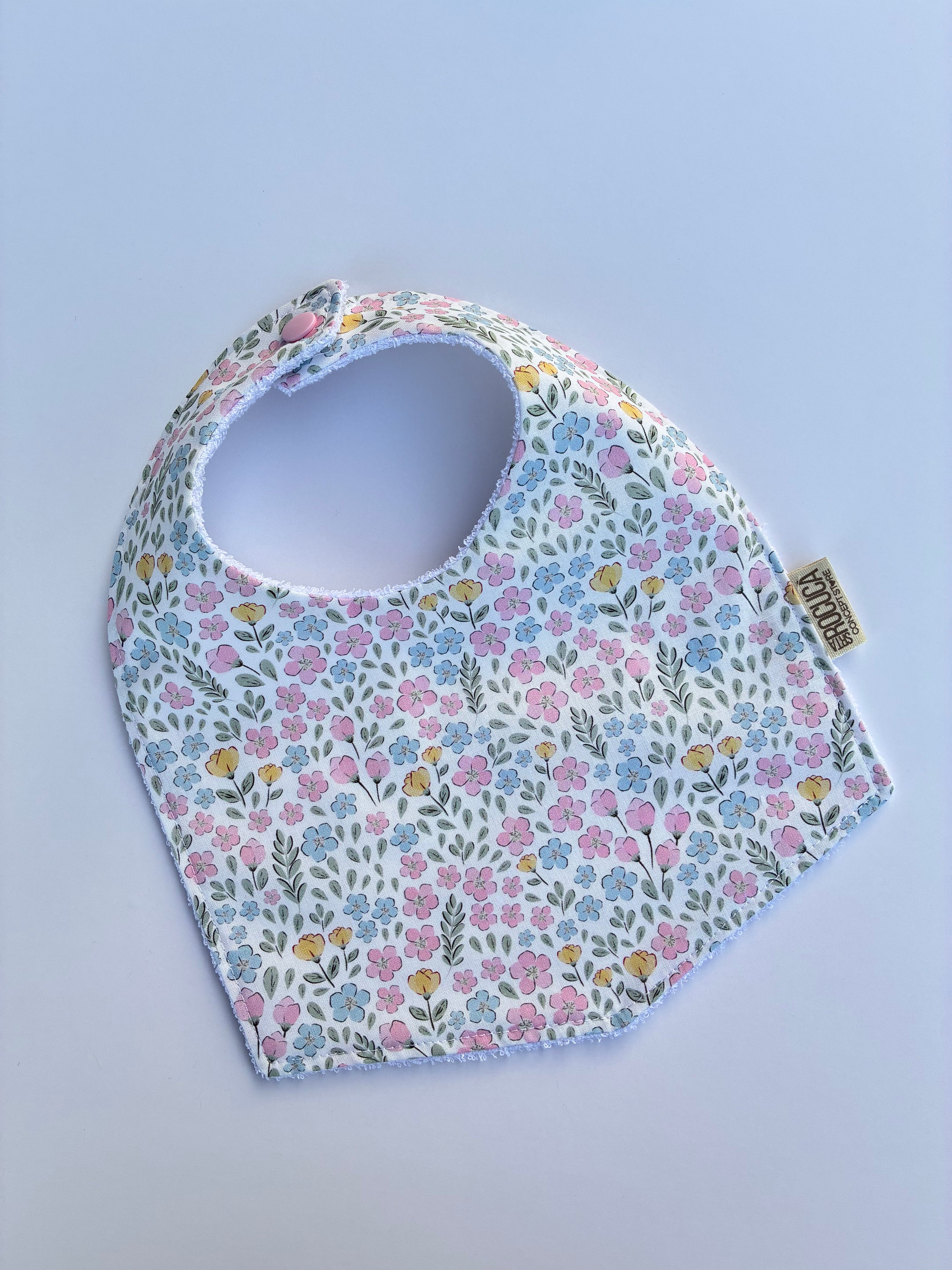Babero clip Aura